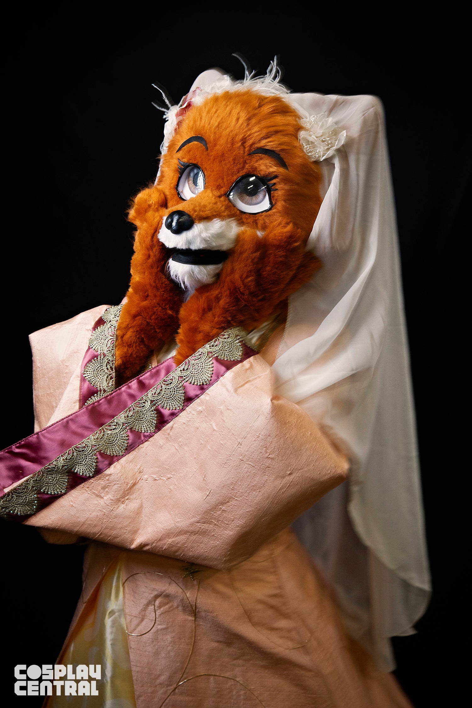 Elektra cosplaying as Maid Marian from DIsney's Robin Hood
