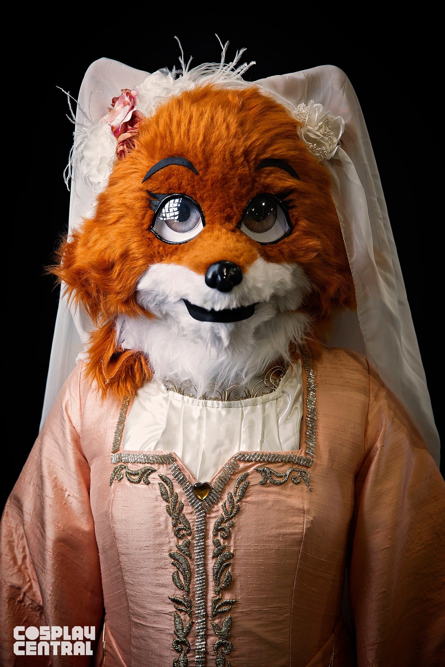 Elektra cosplaying as Maid Marian from DIsney's Robin Hood
