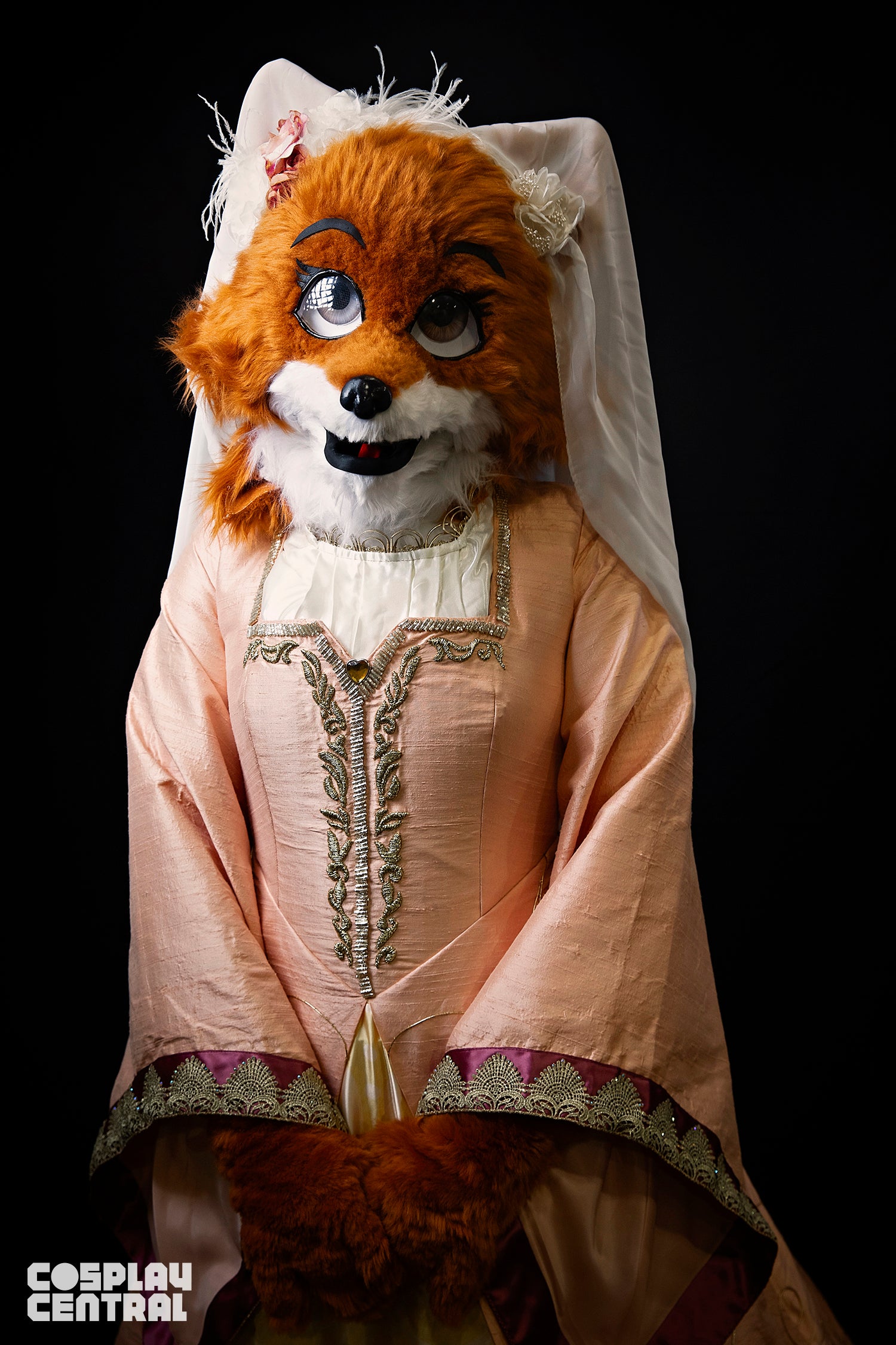 Elektra cosplaying as Maid Marian from DIsney's Robin Hood