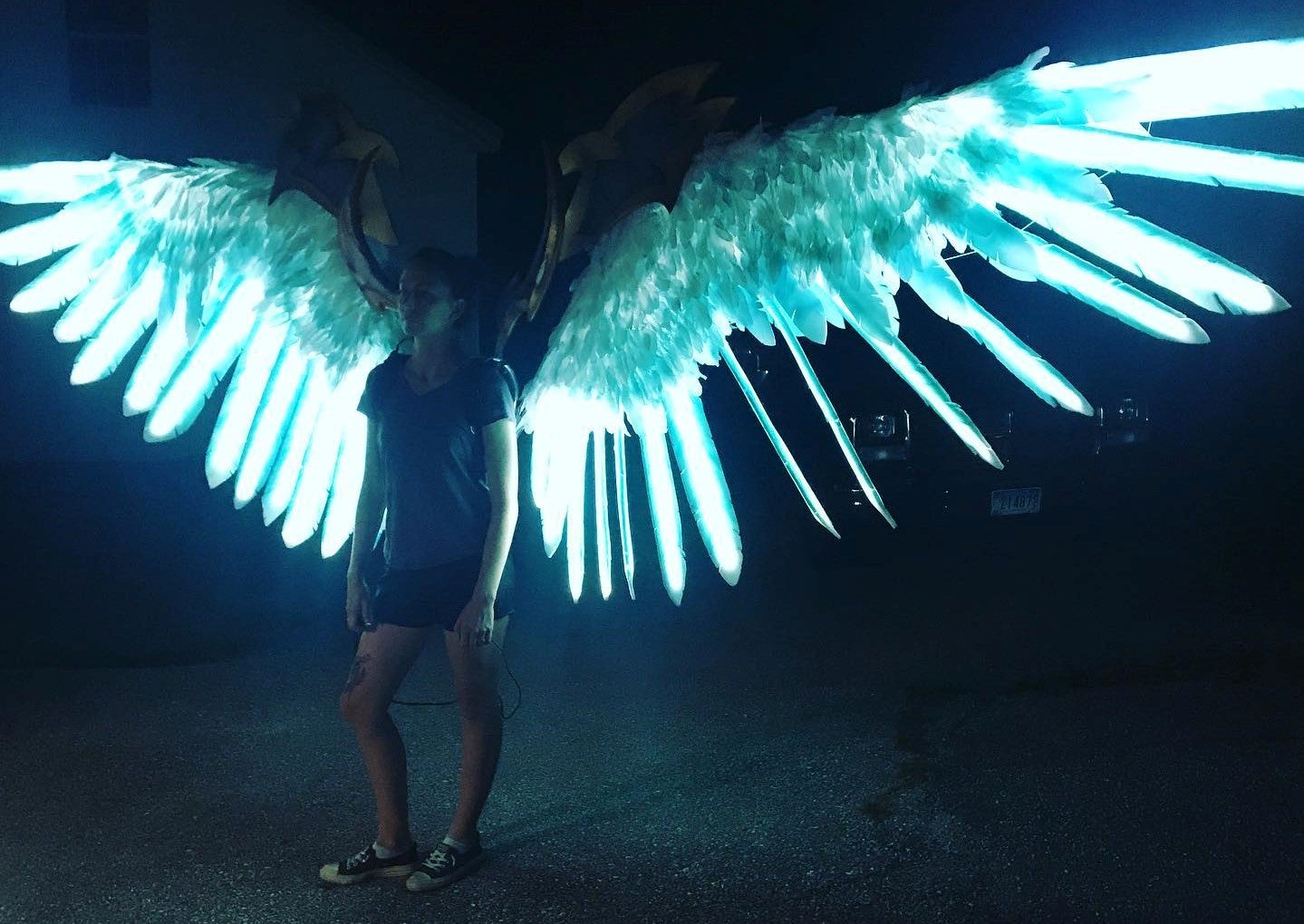 Plexi Cosplay's LED motorized wings for her Pride cosplay from Darksiders.