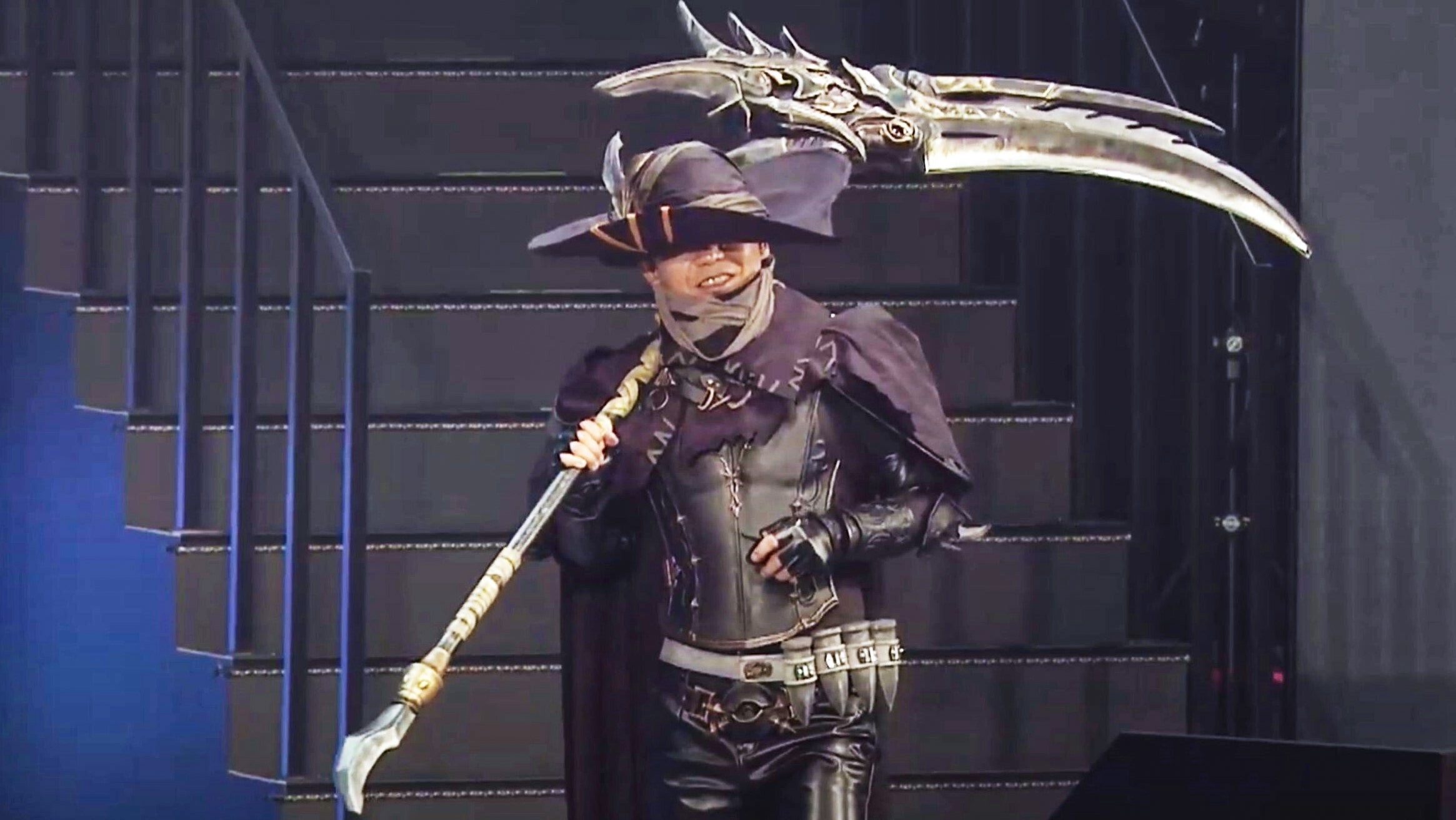Naoki Yoshida cosplaying as the Reaper at the Final Fantasy XIV Digital FanFest